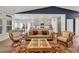 An open-concept living room flows into a modern kitchen and dining area, perfect for entertaining at 2418 Goldfinch Dr., Myrtle Beach, SC 29577