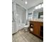 Nicely appointed bathroom with vanity cabinet for storage and shower and tub combo with relaxing décor at 2710 N Ocean Blvd. # 1038, Myrtle Beach, SC 29577