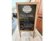 Sign with hours of operation for the coffee shop and Indigo restaurant at 2710 N Ocean Blvd. # 1038, Myrtle Beach, SC 29577
