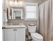 Neutral bathroom with a white vanity and an enclosed shower at 3065 Moss Bridge Ln., Myrtle Beach, SC 29579