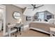 Bright bedroom features a desk area, TV, and comfortable bed at 3065 Moss Bridge Ln., Myrtle Beach, SC 29579