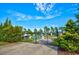 Gated boat storage area with private property signs, surrounded by trees and vegetation at 3065 Moss Bridge Ln., Myrtle Beach, SC 29579
