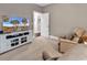 Comfortable bonus room with seating area, TV, and access to bathroom at 3065 Moss Bridge Ln., Myrtle Beach, SC 29579