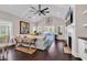 Spacious living room featuring dark wood floors and access to an outdoor patio at 3065 Moss Bridge Ln., Myrtle Beach, SC 29579