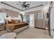 Serene main bedroom featuring a tray ceiling and en suite bathroom at 3065 Moss Bridge Ln., Myrtle Beach, SC 29579