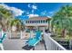 Relaxing deck area features a blue lounge chair overlooking the tranquil canal views at 321 52Nd Ave. N, North Myrtle Beach, SC 29582