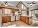 Well-lit kitchen with white appliances, ample cabinet space, and convenient access to the dining area at 321 52Nd Ave. N, North Myrtle Beach, SC 29582