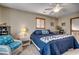 Inviting main bedroom with a ceiling fan, comfortable seating, and a king-size bed at 321 52Nd Ave. N, North Myrtle Beach, SC 29582