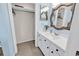 Well-maintained bathroom with a framed mirror, white vanity, and storage space at 351 Lake Arrowhead Rd. # 12-347, Myrtle Beach, SC 29572