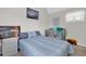 A cozy bedroom featuring a striped bed, car decor, and natural light at 351 Lake Arrowhead Rd. # 12-347, Myrtle Beach, SC 29572