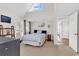 Comfortable bedroom featuring vaulted ceilings, natural light, and a cozy atmosphere with a view to the exterior at 351 Lake Arrowhead Rd. # 12-347, Myrtle Beach, SC 29572