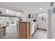 The kitchen opens to the living room and features an island with seating and casual dining space at 351 Lake Arrowhead Rd. # 12-347, Myrtle Beach, SC 29572