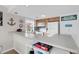 Practical kitchen design with breakfast bar, white appliances, and playful decor for a welcoming vibe at 351 Lake Arrowhead Rd. # 12-347, Myrtle Beach, SC 29572