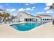 Community swimming pool with lounge chairs and a covered pavilion at 351 Lake Arrowhead Rd. # 12-347, Myrtle Beach, SC 29572