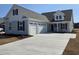 Charming single-Gathering home with a three-car garage and inviting curb appeal at 358 Starlit Way, Myrtle Beach, SC 29579