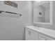 Bright bathroom features a modern white vanity and a stylish framed mirror at 3700 Golf Colony Lane # 18-I, Little River, SC 29566