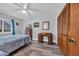 Cozy bedroom with wood-look floors, a comfortable bed, and ample closet space at 3700 Golf Colony Lane # 18-I, Little River, SC 29566