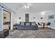 Comfortable living room with sliding doors to a bedroom and a cozy seating arrangement at 3700 Golf Colony Lane # 18-I, Little River, SC 29566