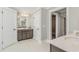 Spacious bathroom with double vanity, walk-in closet, and tile floor at 4008 Bucolic Loop, Myrtle Beach, SC 29588