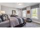 Comfortable bedroom with neutral decor and ample natural light at 4008 Bucolic Loop, Myrtle Beach, SC 29588