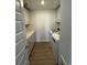 Modern laundry room with updated washer, dryer, cabinets, and countertop space at 4008 Bucolic Loop, Myrtle Beach, SC 29588