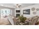 Bright living room with fireplace, shiplap accent wall, and lots of natural light at 4008 Bucolic Loop, Myrtle Beach, SC 29588