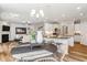 Open-concept living space featuring a dining area, a kitchen, and a cozy living room with a fireplace at 4008 Bucolic Loop, Myrtle Beach, SC 29588