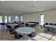 Spacious meeting room with neutral tones, light wood flooring, and abundant seating arrangement at 4008 Bucolic Loop, Myrtle Beach, SC 29588