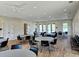 Large meeting room with neutral paint and plenty of round tables to seat large gatherings at 4008 Bucolic Loop, Myrtle Beach, SC 29588
