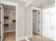 Spacious walk-in closet with extensive shelving and storage, perfect for organizing clothes and accessories at 4008 Bucolic Loop, Myrtle Beach, SC 29588