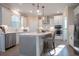 Bright kitchen featuring an island with seating, stainless steel appliances, and modern pendant lights at 4035 Bucolic Loop, Myrtle Beach, SC 29588