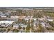 An aerial view captures a charming community with tree lined streets and nearby commercial areas at 404 71St Ave. N # 709, Myrtle Beach, SC 29572
