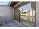 Balcony with sliding glass doors leading to the outside and adjacent storage space at 404 71St Ave. N # 709, Myrtle Beach, SC 29572
