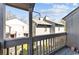 A view from the balcony to the outside shows other apartments and mature landscaping at 404 71St Ave. N # 709, Myrtle Beach, SC 29572