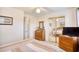 Bedroom featuring mirrored closet doors, dresser and doorway to full bath at 4283 Santolina Way # H, Murrells Inlet, SC 29576