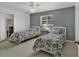 Cozy bedroom featuring twin beds, neutral color tones, and carpeted floors for a warm and inviting feel at 4291 Parkway Ln. # 4291, Little River, SC 29566