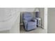 Bedroom nook with a blue patterned recliner next to a small table with a lamp at 4291 Parkway Ln. # 4291, Little River, SC 29566