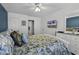Bright bedroom featuring a television, walk in closet, and soft decor that compliments the room at 4291 Parkway Ln. # 4291, Little River, SC 29566