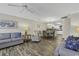 Inviting living room with stylish decor and an open floor plan that flows into the dining area and kitchen at 4291 Parkway Ln. # 4291, Little River, SC 29566