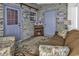 Charming sunroom with decorative brick walls and comfortable seating at 4291 Parkway Ln. # 4291, Little River, SC 29566