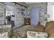 Charming sunroom with decorative brick walls and comfortable seating at 4291 Parkway Ln. # 4291, Little River, SC 29566