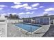 Community outdoor pool with well-maintained surroundings and cabana in a gated area at 4291 Parkway Ln. # 4291, Little River, SC 29566