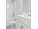 Bathroom featuring tub, vanity, toilet, tile flooring, and large mirror at 4344 Jones Rd., Myrtle Beach, SC 29588