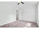Bedroom featuring neutral carpet, double closet, ceiling fan, and neutral paint at 4344 Jones Rd., Myrtle Beach, SC 29588