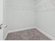 Walk-in closet featuring carpet and metal shelving for optimal storage at 4344 Jones Rd., Myrtle Beach, SC 29588