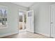 Bright entryway with wood-look flooring and a view of the outdoors through the front door at 4344 Jones Rd., Myrtle Beach, SC 29588