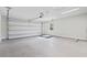 Spacious garage boasts ample room for parking and storage, with white door at 4344 Jones Rd., Myrtle Beach, SC 29588