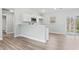 Bright kitchen features white cabinets, stainless appliances, and beautiful countertops at 4344 Jones Rd., Myrtle Beach, SC 29588