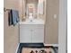 Compact bathroom featuring a single sink vanity with storage and a neutral color palette at 4413 Eastport Blvd. # F-1, Little River, SC 29566