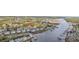 Aerial view features waterfront condos with docks along a waterway, offering serene coastal living at 4430 Eastport Blvd. # L5, Little River, SC 29566
